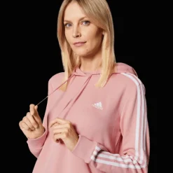 FELPA CON CAPPUCCIO DA DONNA ADIDAS ESSENTIALS ROSSA CON STRISCE LATERALI