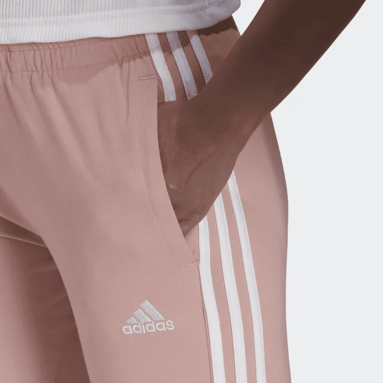 PANTALONI SPRTIVI DA DONNA ADIDAS ESSENTIALS ROSA CON STRISCE BIANCHE